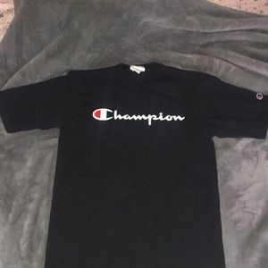 This is a black Champion T-shirt size small woman
